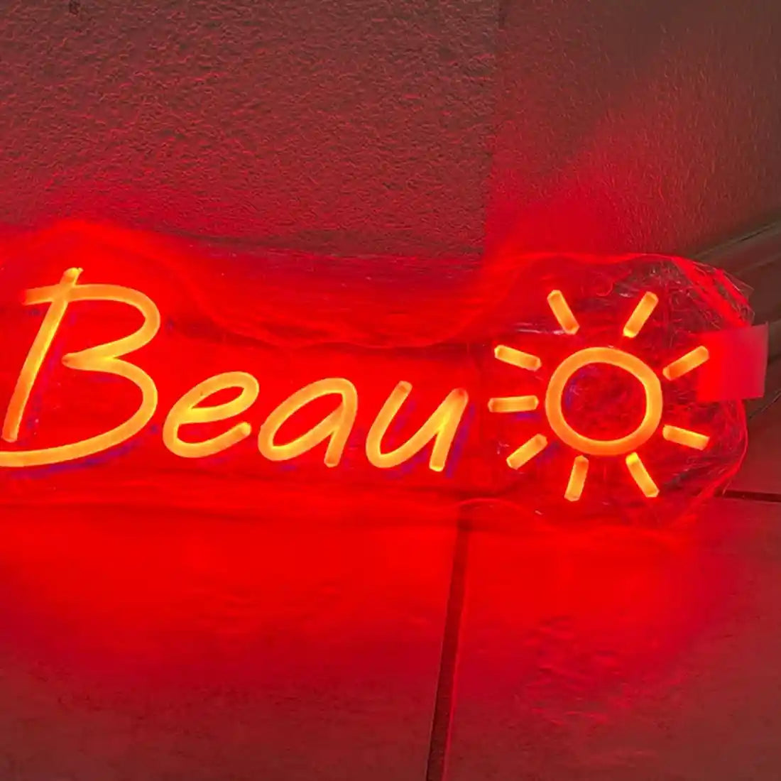 Illuminate your space with the captivating beau-name-neon-sign - from manhattonneons.com.